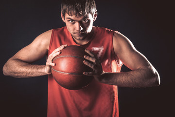 Player holding his basketball ball