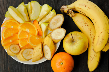 Assortment of juicy fruit on the plate