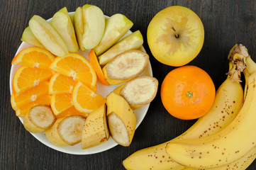 Assortment of juicy fruit on the plate