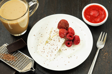 Cottage cheese with fresh berries and coffee with milk for break