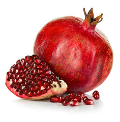 Ripe pomegranates isolated on a white background.