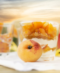 Apricot on background of dessert and sunset sky