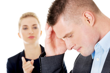 Businesswoman reprimend her partner