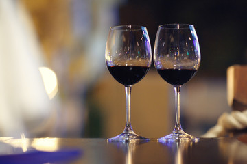 glasses of red wine at restaurant concept alcohol