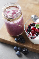 Jar of fresh homemade fruit smoothie and yoghurt,  studio