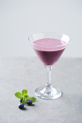 Martini glass with fruit smoothie,  studio