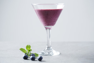 Martini glass with fruit smoothie,  studio