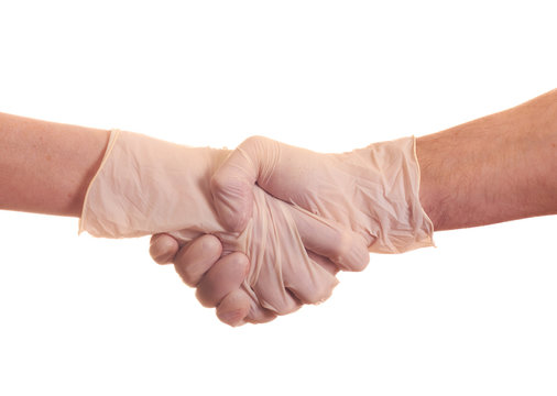 Handsshake in the surgical gloves