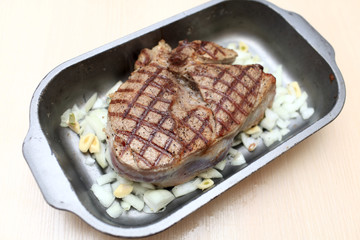Blade steak in baking dish