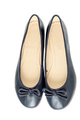Pair of female shoes over white background top