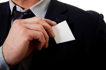 Businessman taking his personal card from pocket.