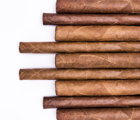 Cigars in a row with space for text. Close-up background