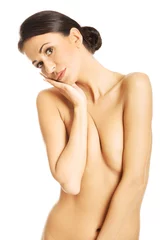 Foto auf Acrylglas Woman covering her breast © Piotr Marcinski