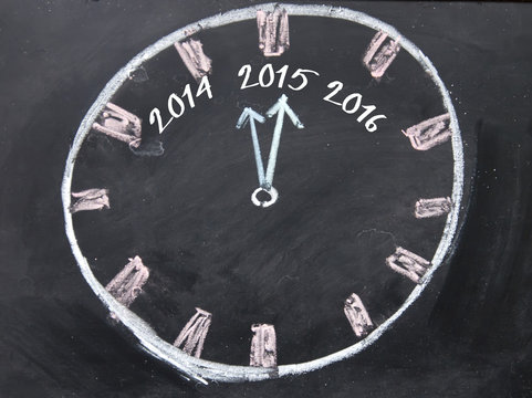 2015 clock sign on blackboard