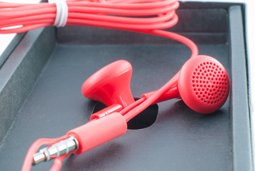 red wired headphones