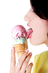 Side view young woman eating an ice cream
