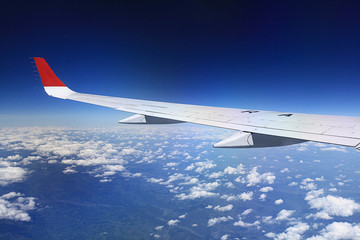 Obraz premium view from the airplane, wings sky