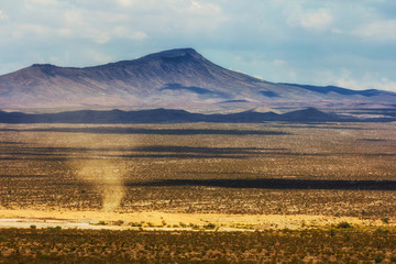 Dust devil in arid desert