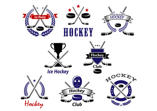 Ice hockey emblems with crossed sticks and pucks