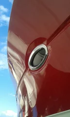 Papier Peint photo Sports nautique Coque de bateau à moteur rouge de super yacht et hublot