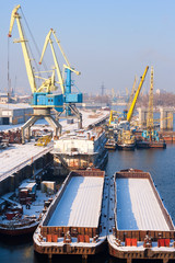 view to empty cargo dock with cranes and containers