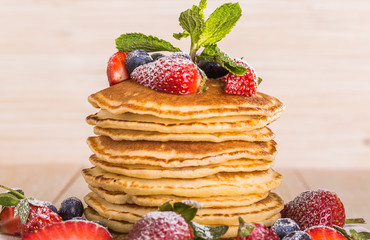 Homemade pancakes with berries and fruit