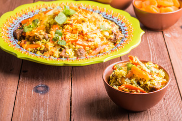 Turkish pilaf with lamb, turmeric and spices in traditional styl