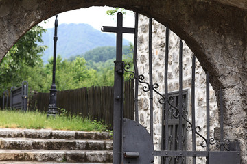 monastery gate, a narrow door the lattice