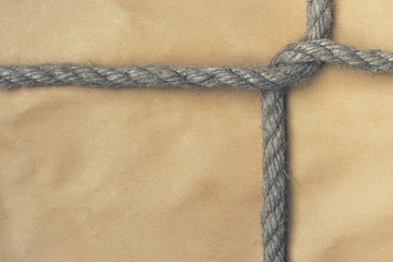 Paper bag tied with a rope