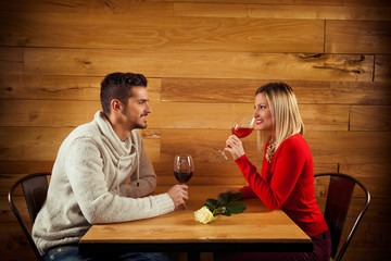 Young couple on a date in a restaurant on a Valentine's Day