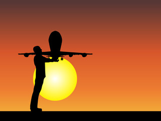 Fototapeta na wymiar Man silhouette with plane at sunset
