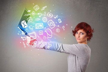 Young lady holding notebook with colorful hand drawn multimedia