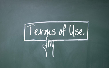 finger click terms of use symbol on blackboard