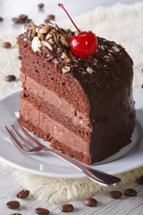 delicious piece of dark chocolate cake with cherry