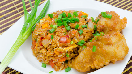 A plate of oriental food Special fried rice with chicken