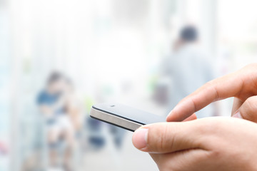 Closeup man hand using smart phone