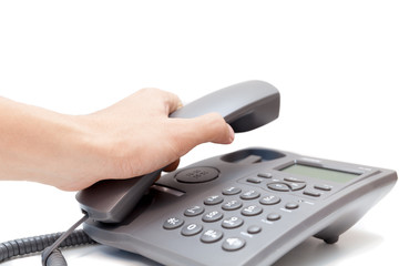 man holding up the phone receiver