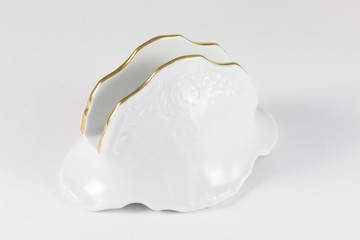 Porcelain stand for napkins with gold border