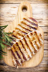 Grilled pork chops pieces. Spices and rosemary.