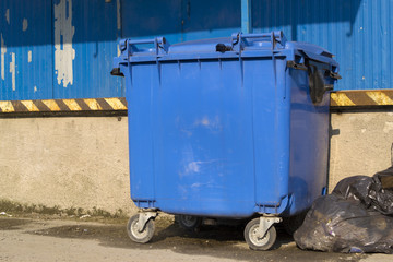 Blue garbage bin