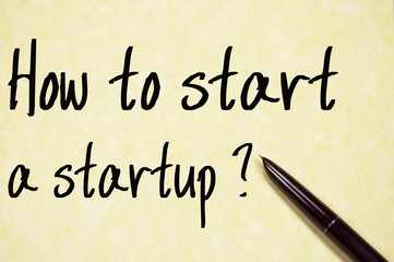 how to start a startup text write on paper