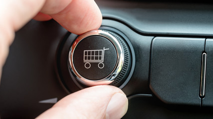 Man turning a dial with shopping cart icon