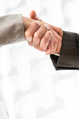 Conceptual Businessmen Shake Hand Sign