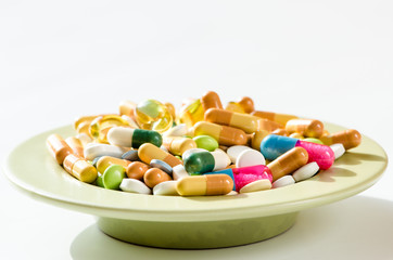 pills on plate isolated