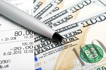 Business concept - money, pen and cash voucher