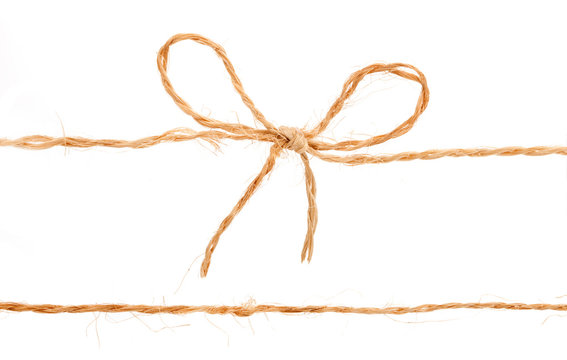 Rope and bow isolated on white background