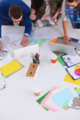 Young business people working at office on new project
