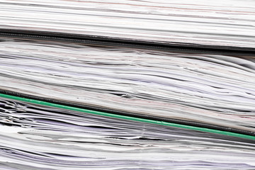 Stack of file folders with documents