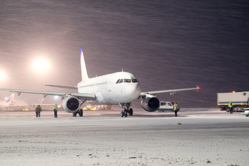 Fototapeta na wymiar Moscow, Russia, 2015: plane parked at the airport in winter