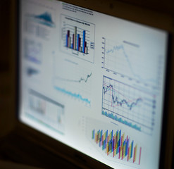 Businessman analyzing investment charts